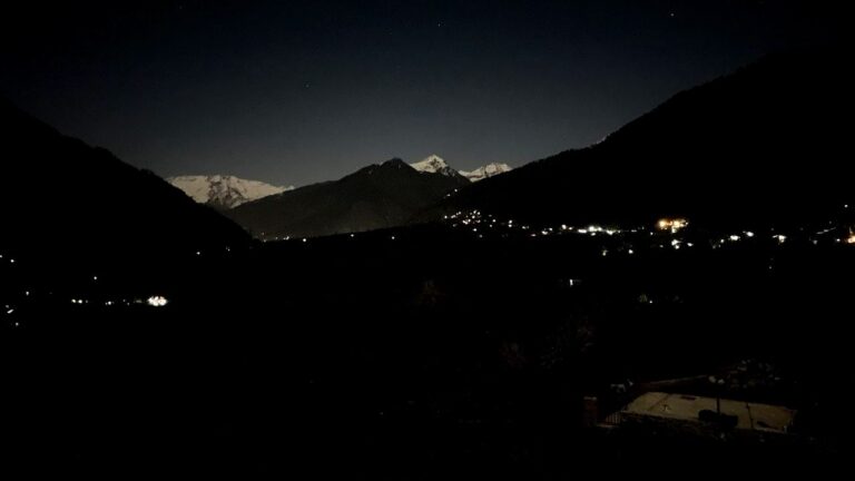 The view from the same balcony as the previous picture at night.
The moonlight reflecting off the snow clad peaks merges with the star studded night sky like lovers long lost.