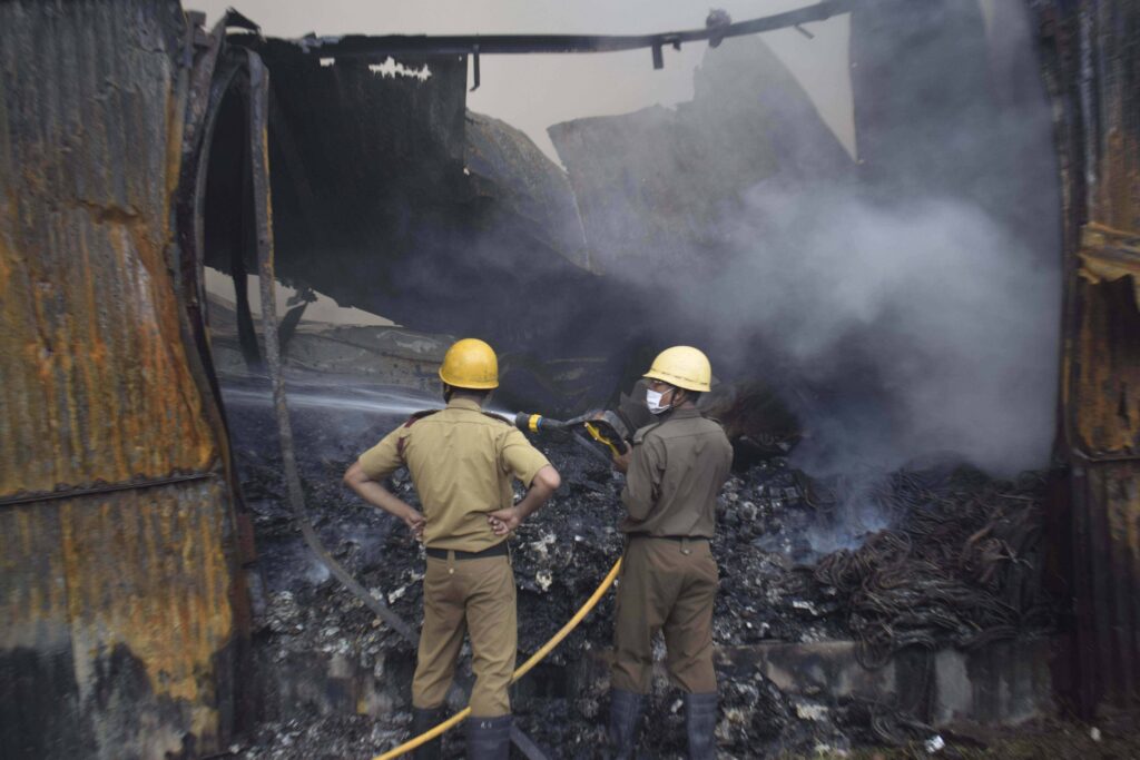 Firefighters at work - arden Reach FCI Warehouse in Kolkata, West Bengal, India.  Photo by Sabyasachi Bandyopadhyay, September 11, 2021.