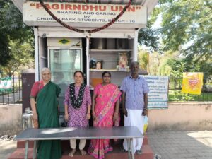 Geetha Kumar along with watchman Sekar and Vimala a staff who takes care of the fridge