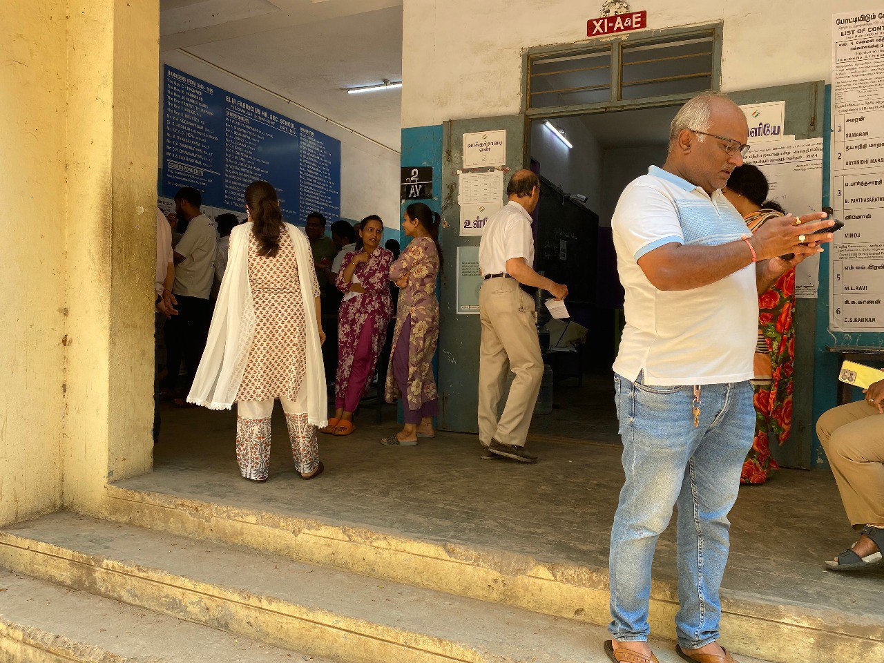 In Que: Voters waiting in que for their turn to exercise their franchise in ELM Fabricius Higher Secondary School in Chennai. Photo: S Vishnu Sharmaa