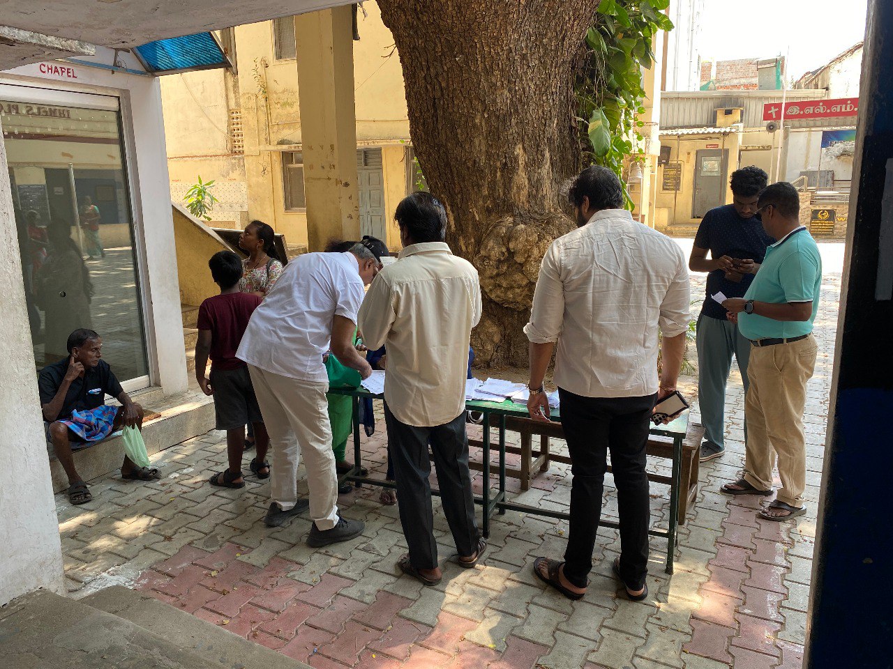 Name in the List: Voters checking their names in the list. Photo: S Vishnu Sharmaa